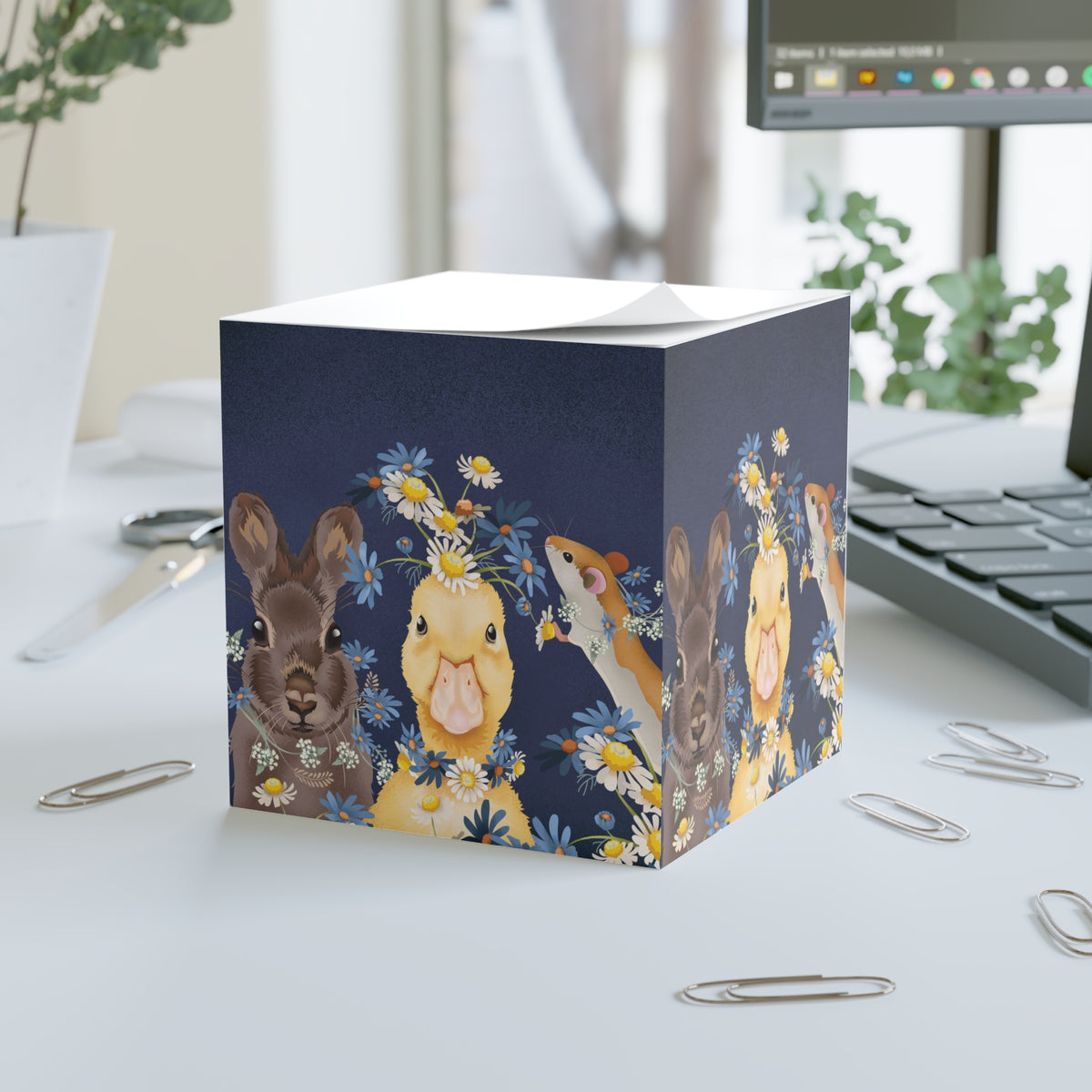 Turn an everyday desk essential into colorful art. The Spring Friends Note Cube features cheerful springtime artwork wrapped around all four sides. 700 pages.
