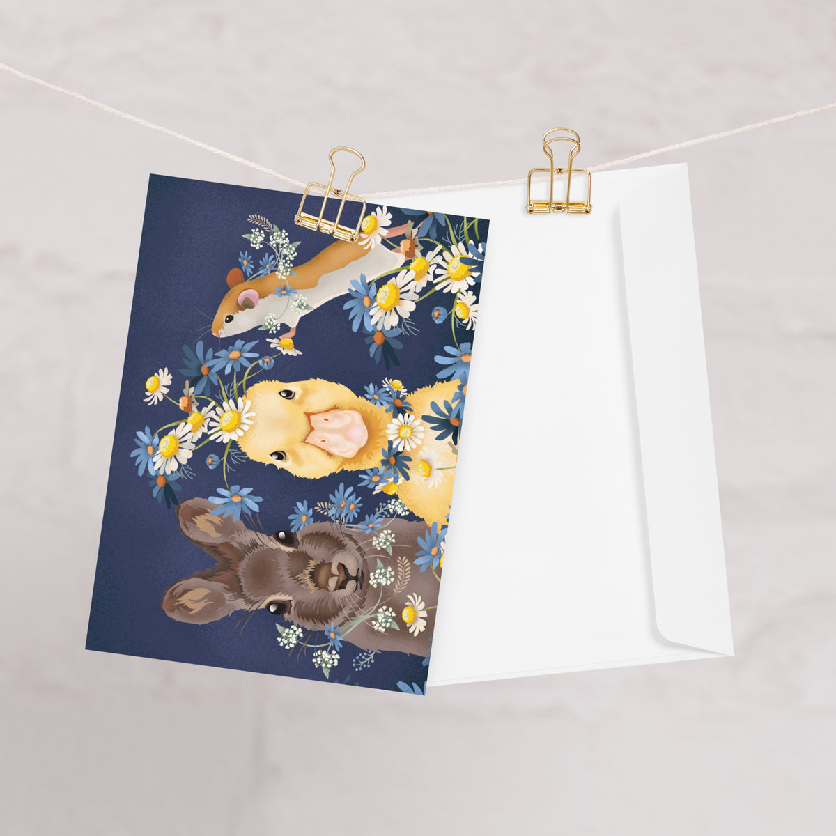 Spring Friends greeting card brings a cheerful gathering of familiar faces. Product mockup displayed on a string.